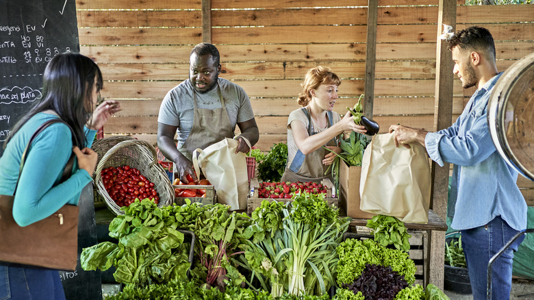 people shopping at farmer's market