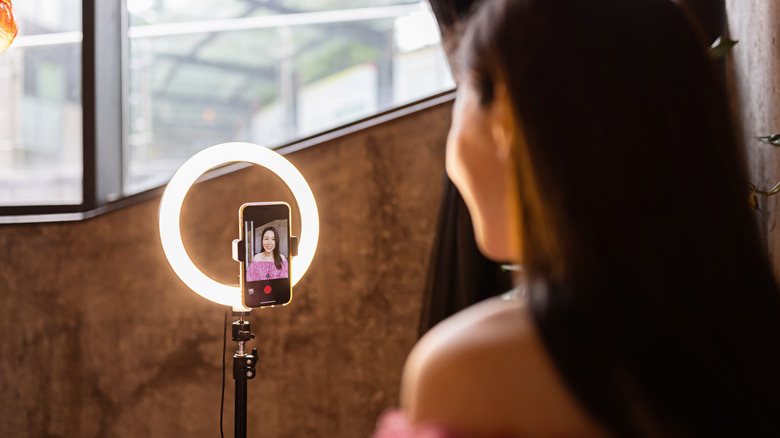 taking a selfie with a ring light