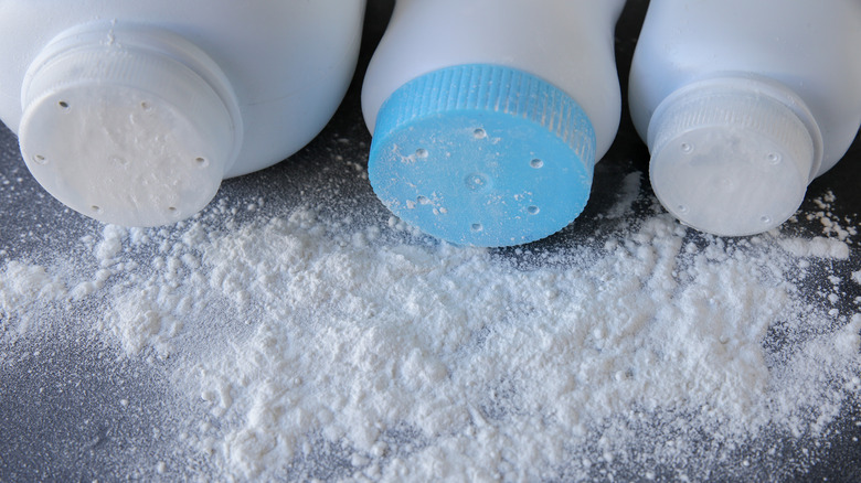 spilled talcum powder bottles