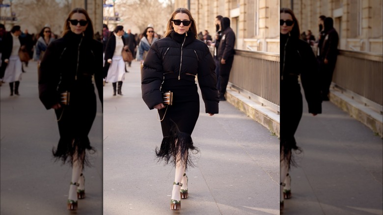 Julia Comil wearing black tassel skirt