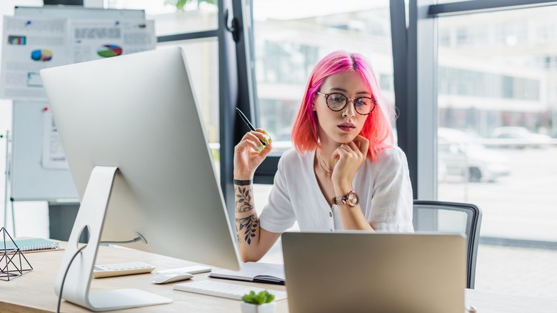 woman working with tattoos