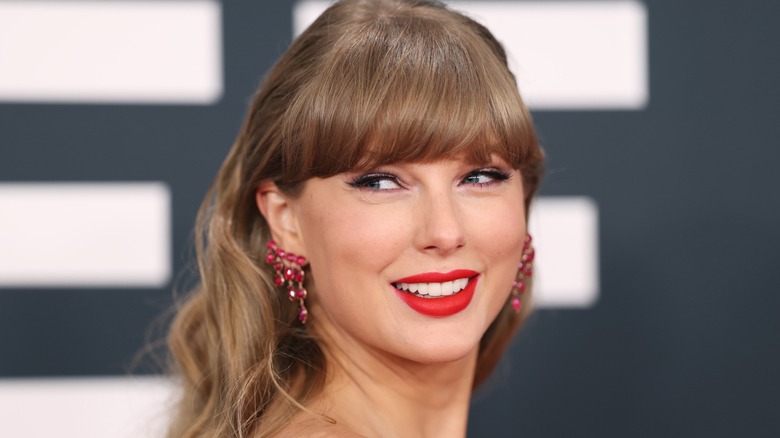 Taylor Swift smiling at the 2026 Grammys.