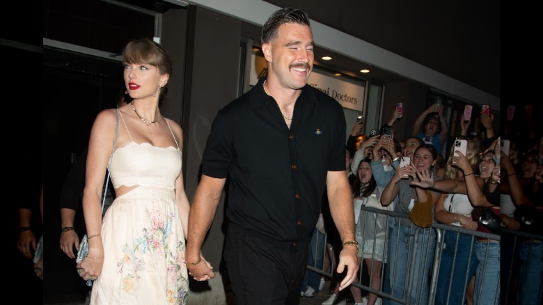 Taylor Swift and Travis Kelce leave Karen Elson's wedding