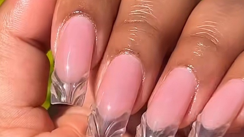 fingers with clear 3D French manicure