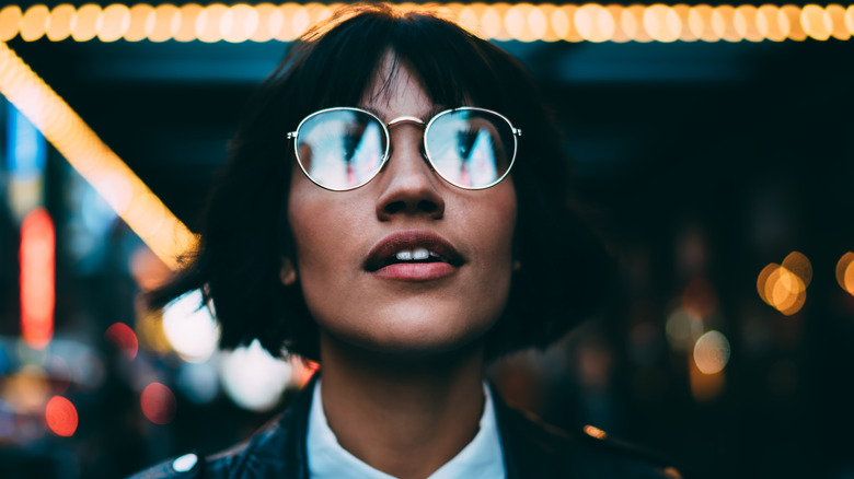 young woman looking toward the future