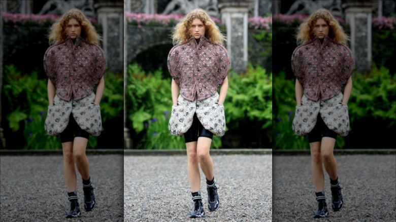 Model walking at Louis Vuitton show