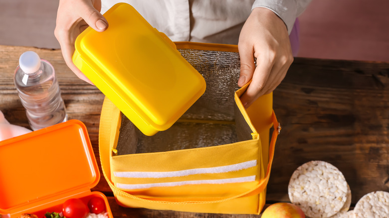 Woman packing lunch for work