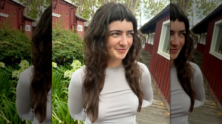 woman with short bangs on long shag