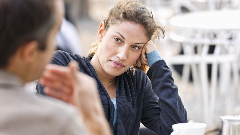 Woman looking at a man