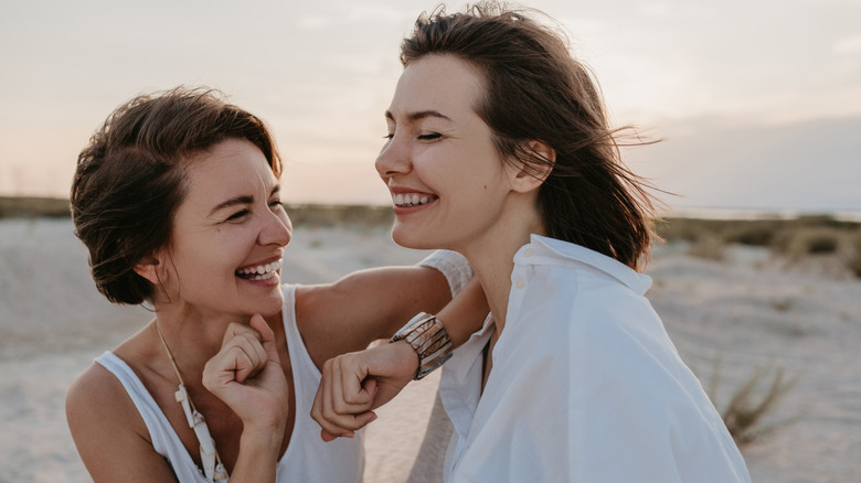 Couple flirting on beach
