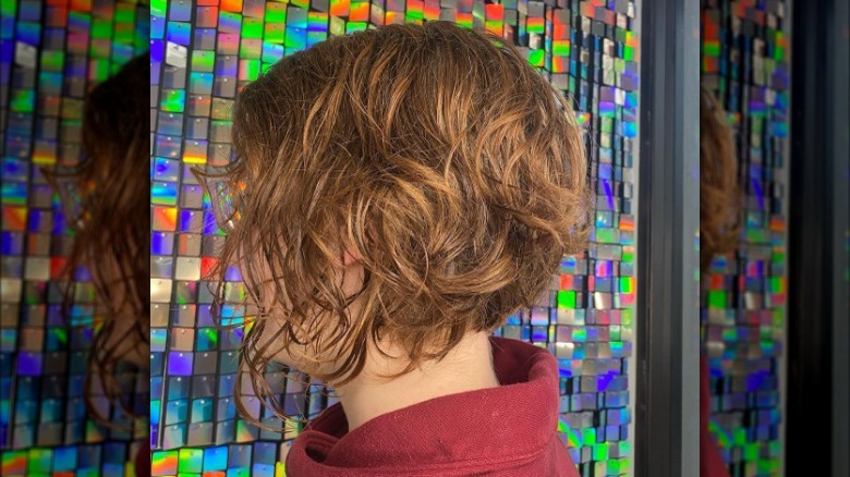 Woman with wavy stacked bob