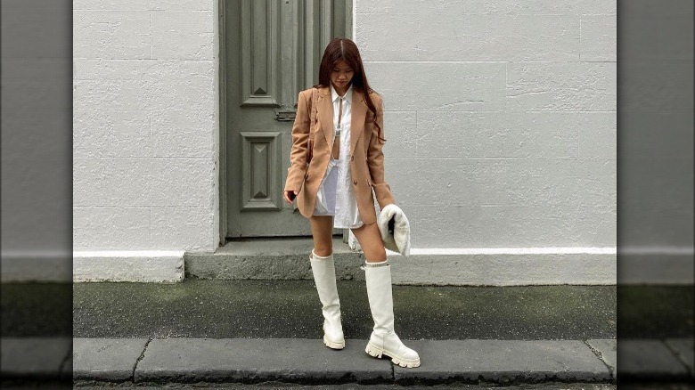 Girl with unbuttoned blazer