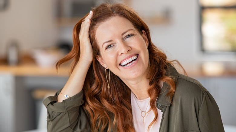 Older woman with red hair