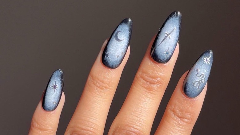 Aura nails with silver embellishments