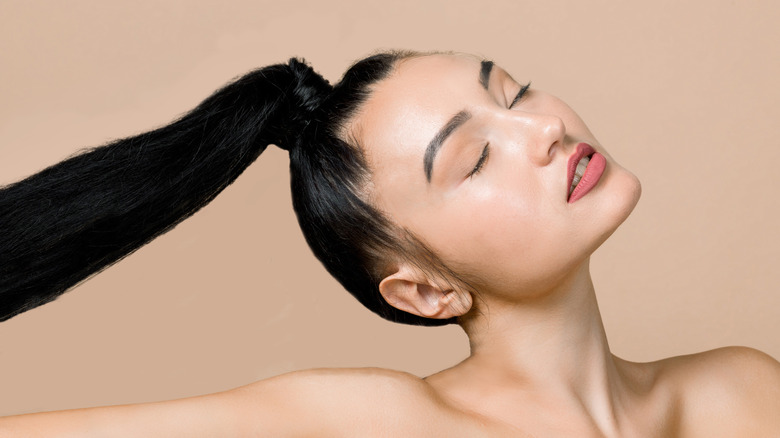 woman with long ponytail