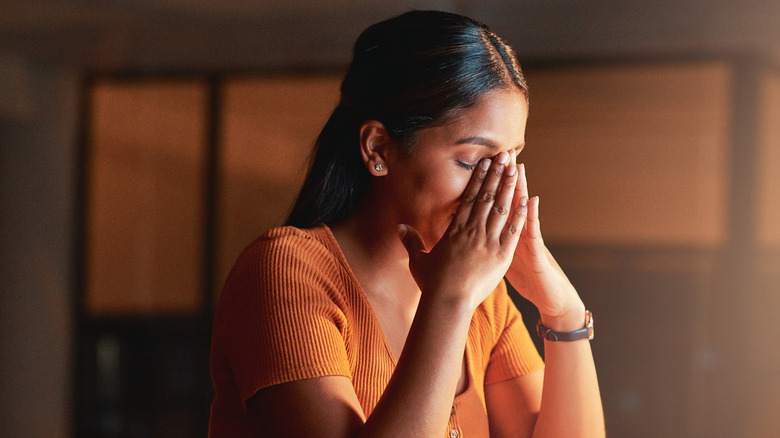 Woman looking very stressed