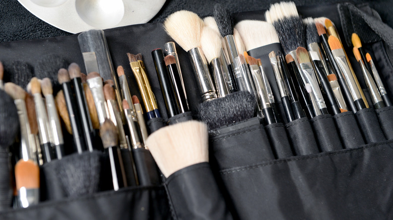 a makeup brush set on a towel