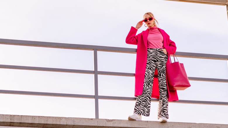 Woman with pink Barbie outfit