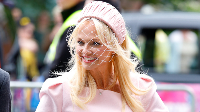 Spice Girl Emma Bunton wearing a pink wedding guest dress