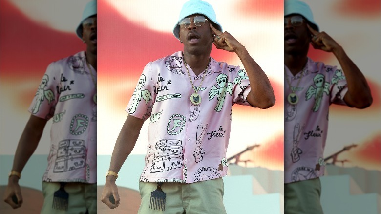 Tyler, the Creator in glasses and hat