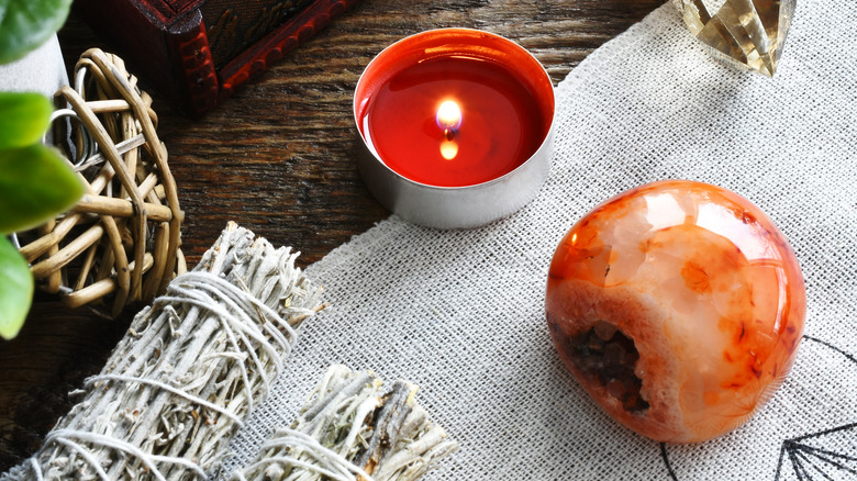 Carnelian sphere, smudge stick