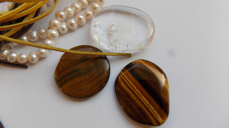 tiger's eye stones on white background