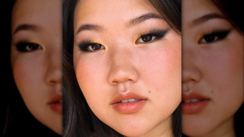 Woman with monolid eyes