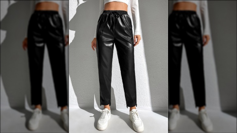 Model wearing leather joggers