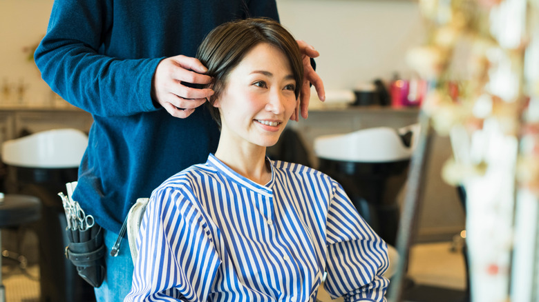 Woman getting a bob haircut