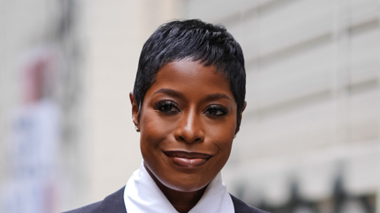 Woman with a blond pixie