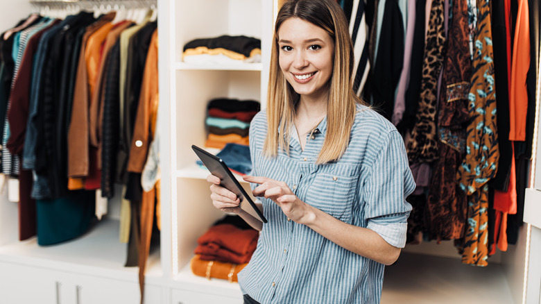 happy woman in clothing boutique