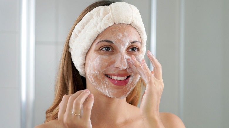 Woman wearing skincare headband