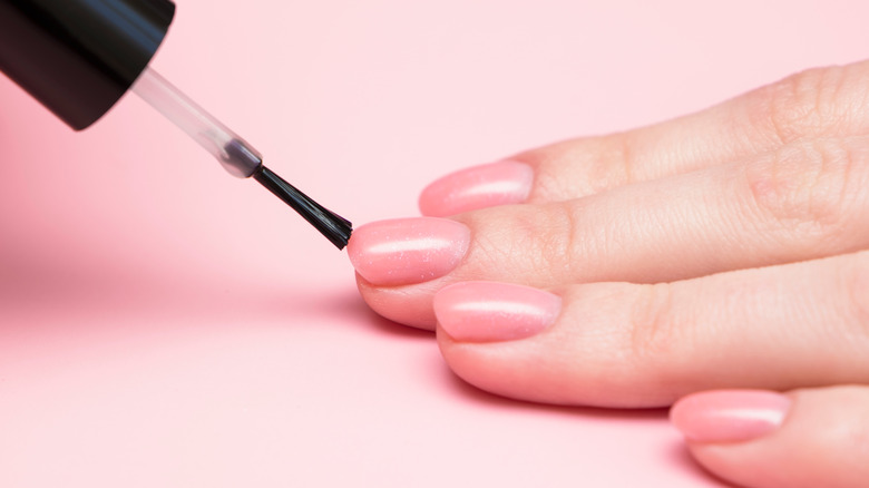 applying nail polish