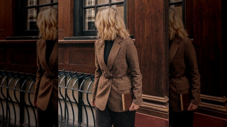 Girl wearing dark academia aesthetic