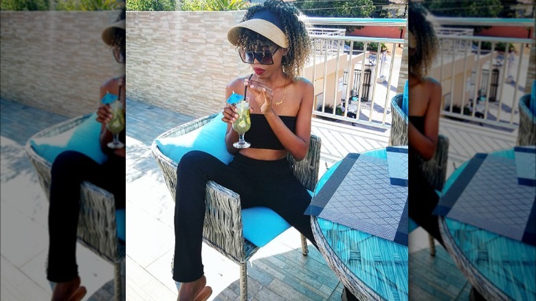 Woman wearing sunglasses outside