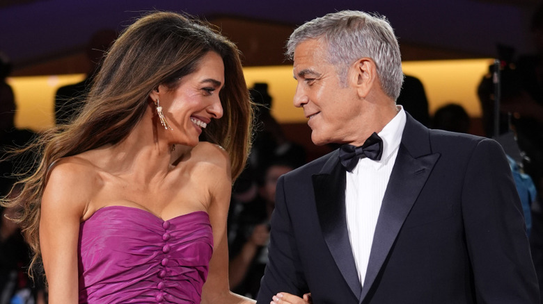 Amal Clooney and George Clooney attend the 