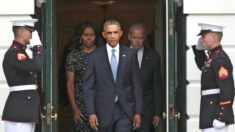 Barack Obama walking ahead of Michelle Obama and Joe Biden as they exited The White House in 2014.