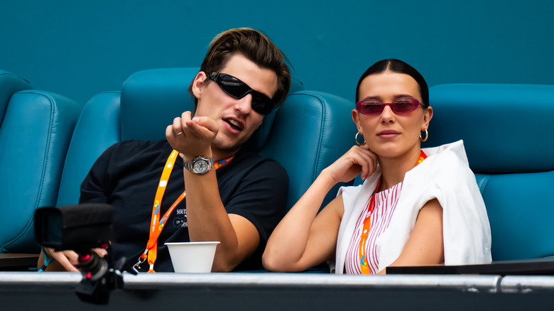 Millie Bobby Brown and Jake Bongiovi at a sporting event