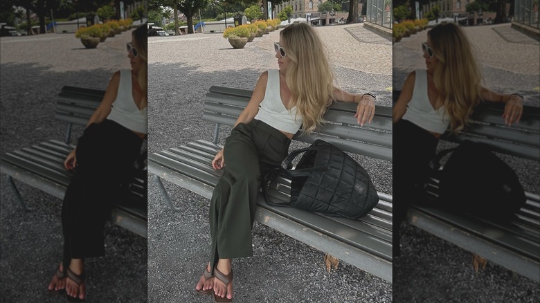 Girl next to a Vee Collective tote.