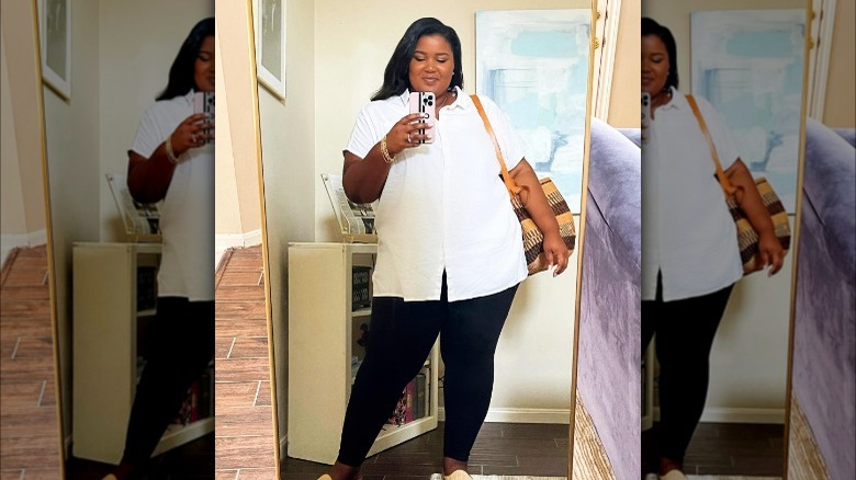 Girl wearing a short sleeve button up.