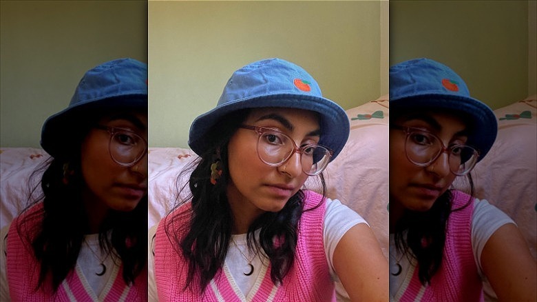 woman wearing fruit print bucket hat