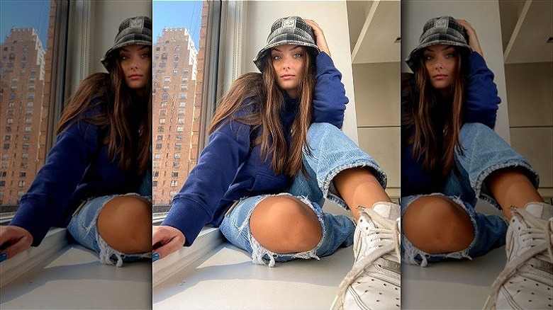 woman wearing gray plaid bucket hat