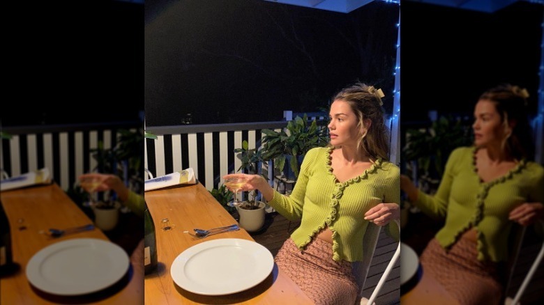 green cardigan and skirt