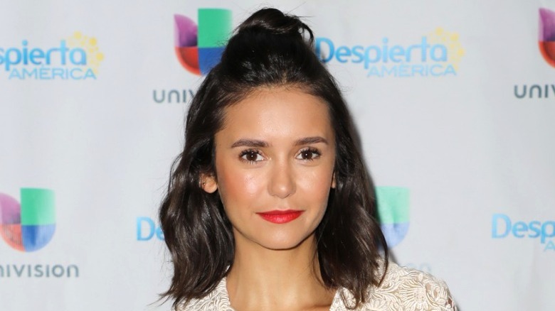 half-up loaded topknot hairstyle