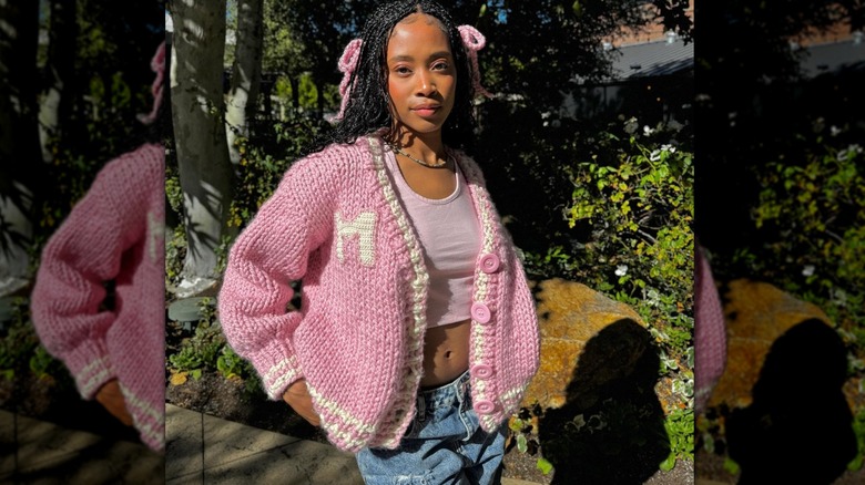 woman wearing pink cardigan