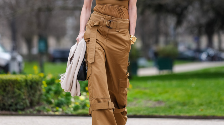 Woman wearing brown cargo pants