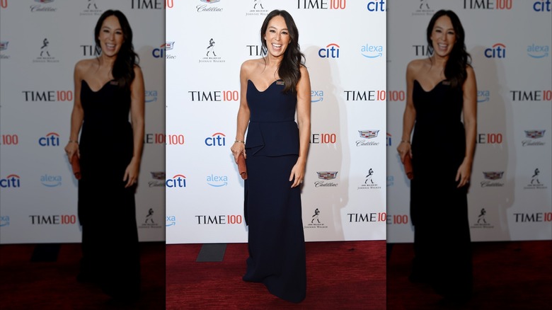 Joanna Gaines in a navy gown on the red carpet