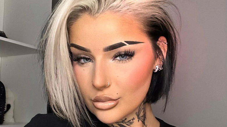 Blond and black hair nose ring