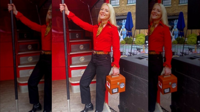 Woman wearing Western-style belt, scarf