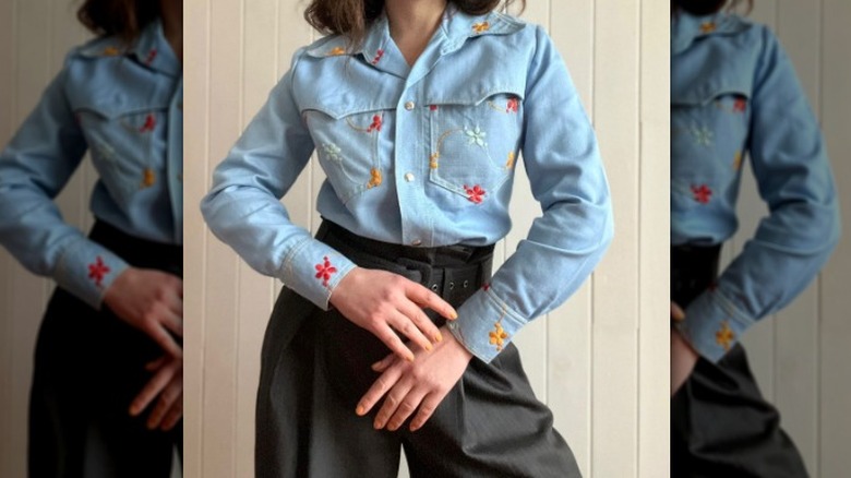 Model in denim button-up shirt